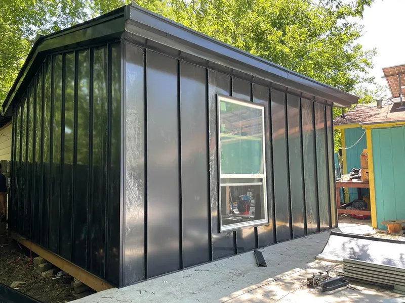 Black standing seam metal wall panels for Roof Inspection in Scenic Oaks